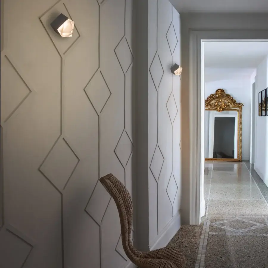 Exclusive Oluce Astro wall lamp crafted in metal and refined glass with a white matte finish