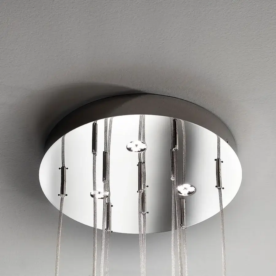 Captivating melogranoblu Gotham suspension lamp with a mirrored canopy and ten pendants in clear and frosted ruled blown glass with colored metallic cords