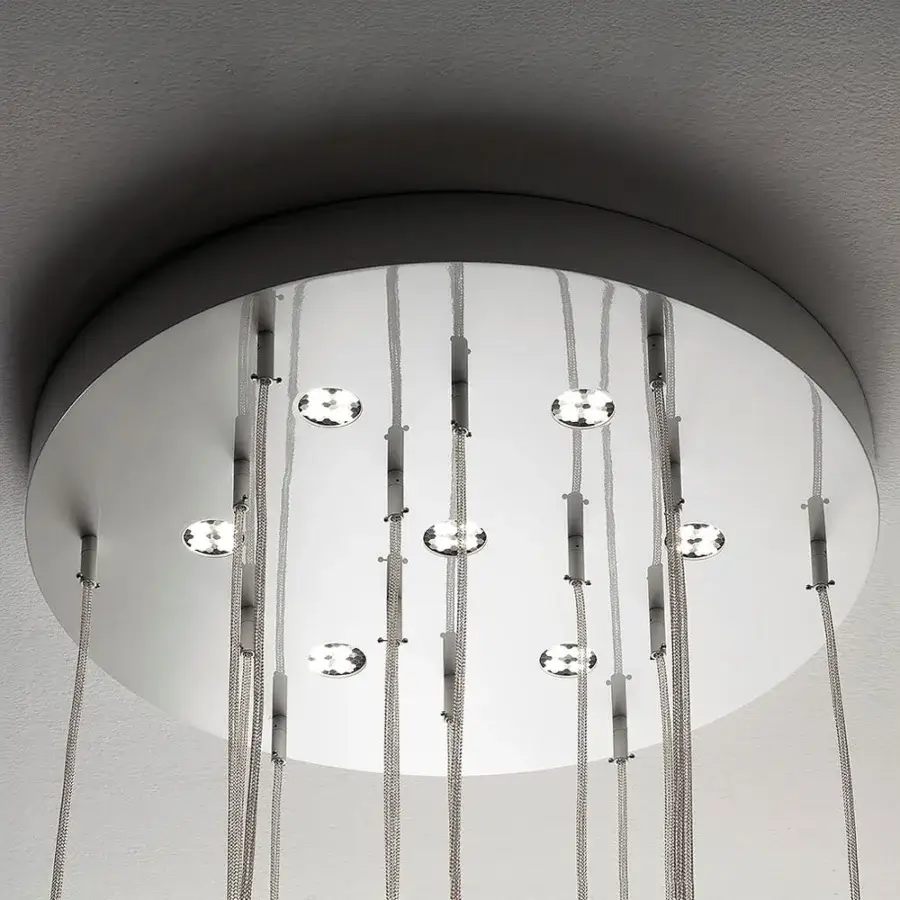 Distinguished melogranoblu Gotham suspension lamp with clear and frosted ruled blown glass pendants and mirrored metal canopy