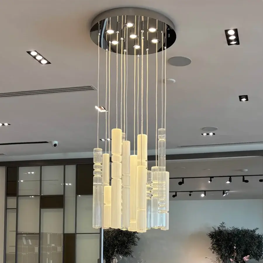 Distinguished melogranoblu Gotham suspension lamp with ten pendants in clear and frosted ruled blown glass and mirrored metal canopy