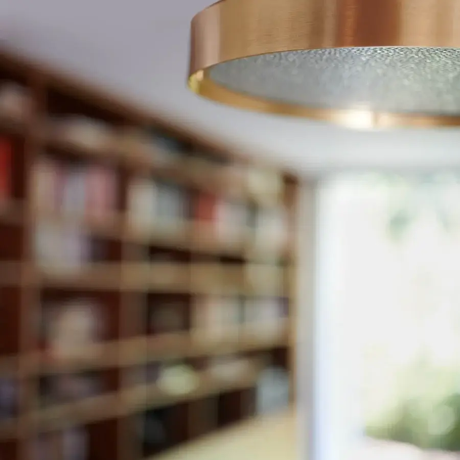 Distinguished Oluce Berlin Wall/Ceiling lamp crafted in brass-toned metal with a finely wired glass diffuser and warm finish