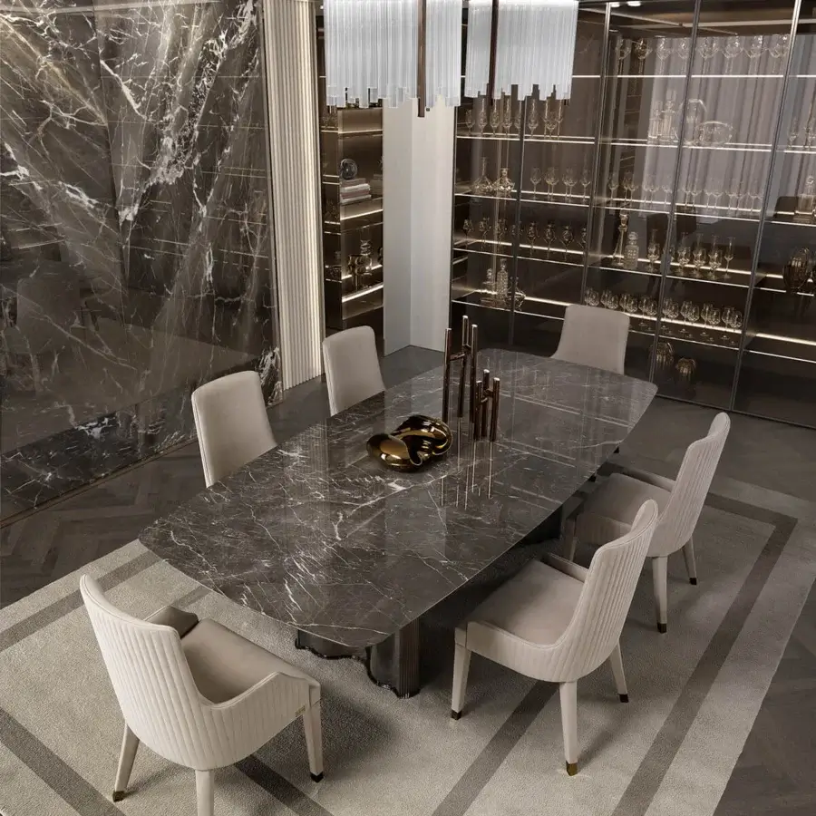 Distinguished DV Home Collection Manhattan table with a dark gray marble slab and brushed silver stainless steel base