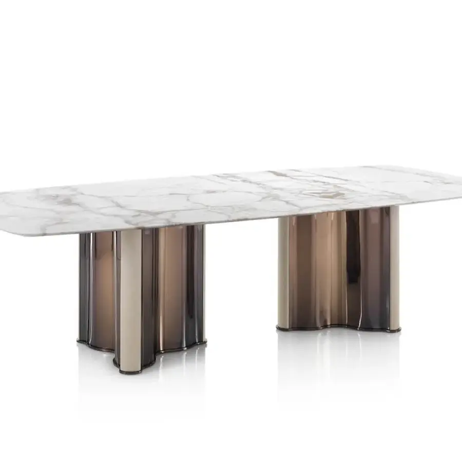 Exceptional DV Home Collection Manhattan table crafted in Italy with a white marble top and warm amber stainless steel base