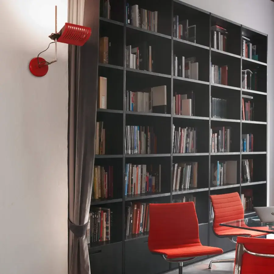 Distinctive Oluce Colombo wall lamp crafted in metal with a glossy red finish and articulated orange arm