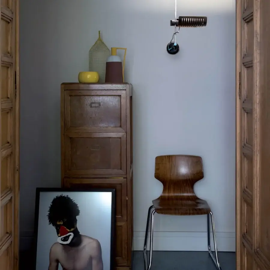 Elegant Oluce Colombo wall lamp crafted in Italy with matte black metal and adjustable reflector
