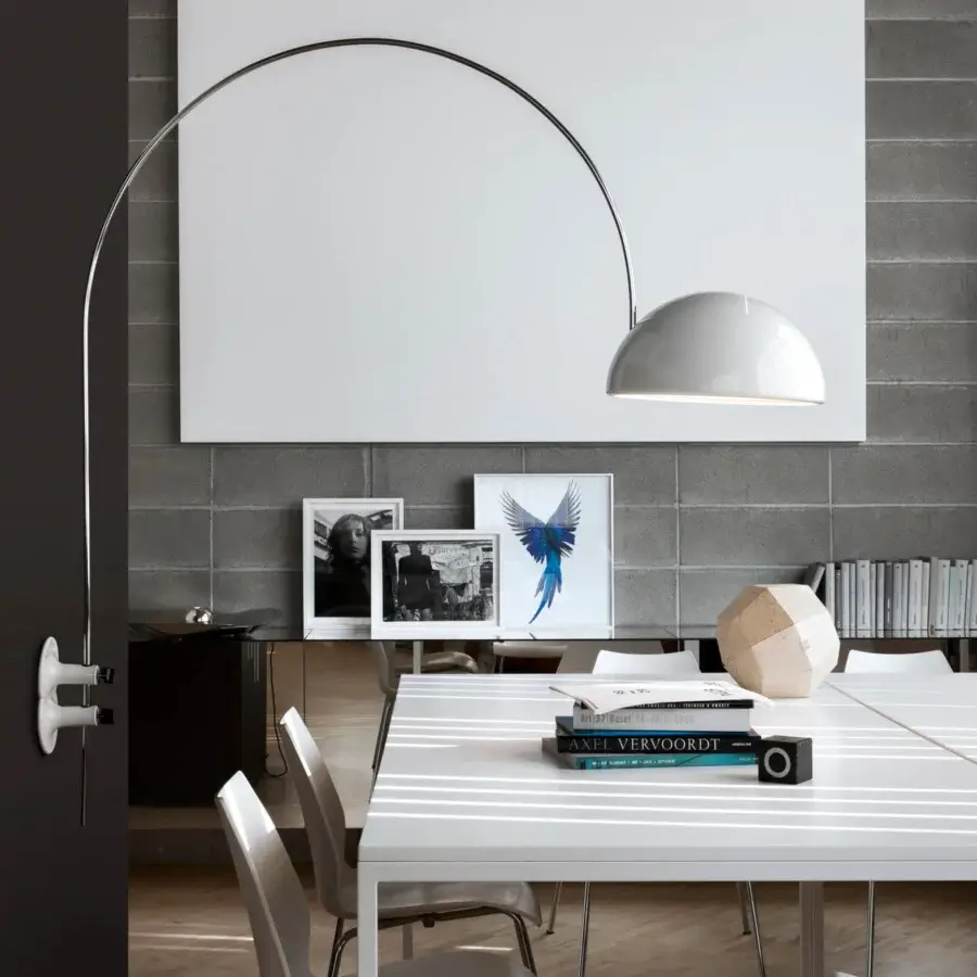 Exceptional Oluce Coupé wall lamp crafted in metal with a glossy white finish delivering directed light