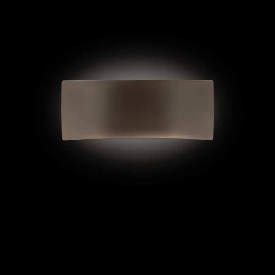 Distinguished Oluce Lens wall lamp crafted in Italy with matte metal and muted bronze finish