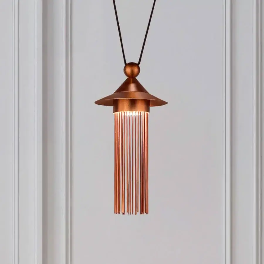 Distinguished Masiero Nappe suspension lamp crafted in painted metal with a warm coppery finish and delicate metal rods for ambient lighting