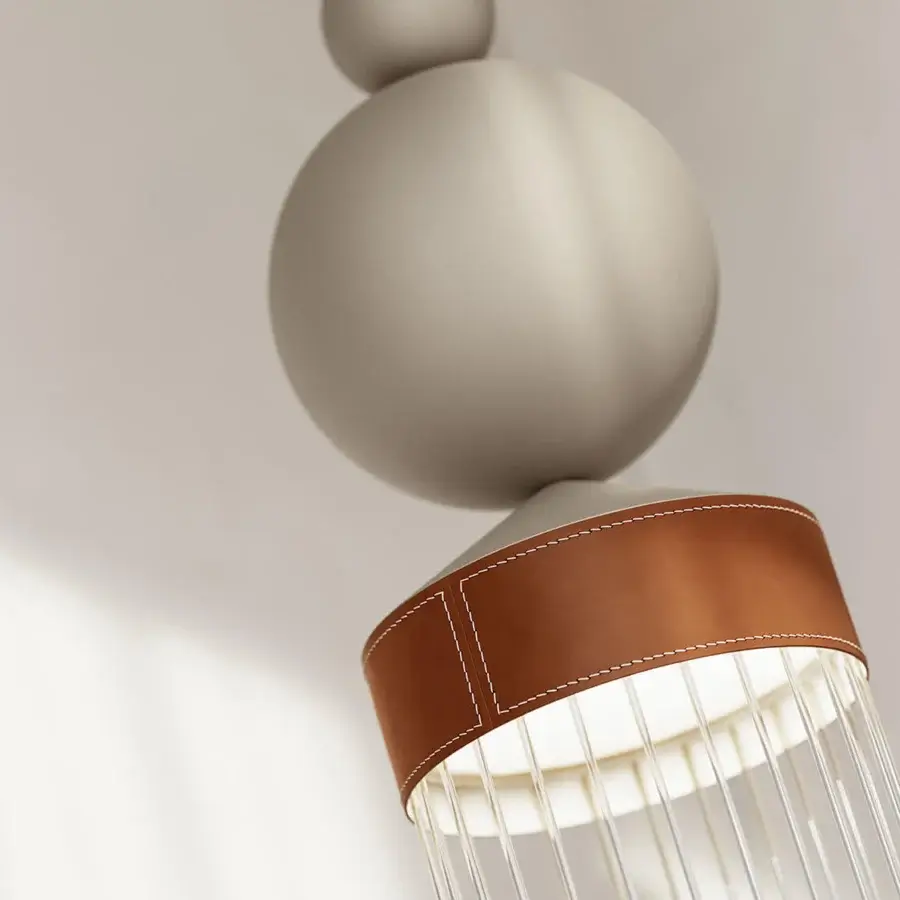 Exclusive Masiero Nappe XL-XM suspension lamp in painted metal with a brown leather finish offering a contemporary form
