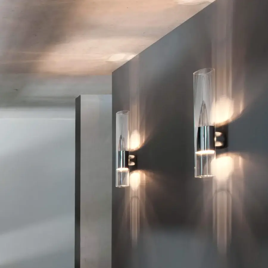 Superior Oluce Line wall lamp crafted in special oval Pyrex glass with polished aluminum coating for diffused glow