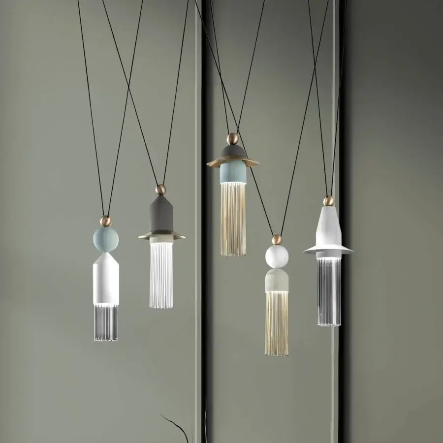 Distinguished Masiero Nappe suspension lamp with vertically elongated forms crafted in painted metal, Pyrex rods, and brass-colored accents