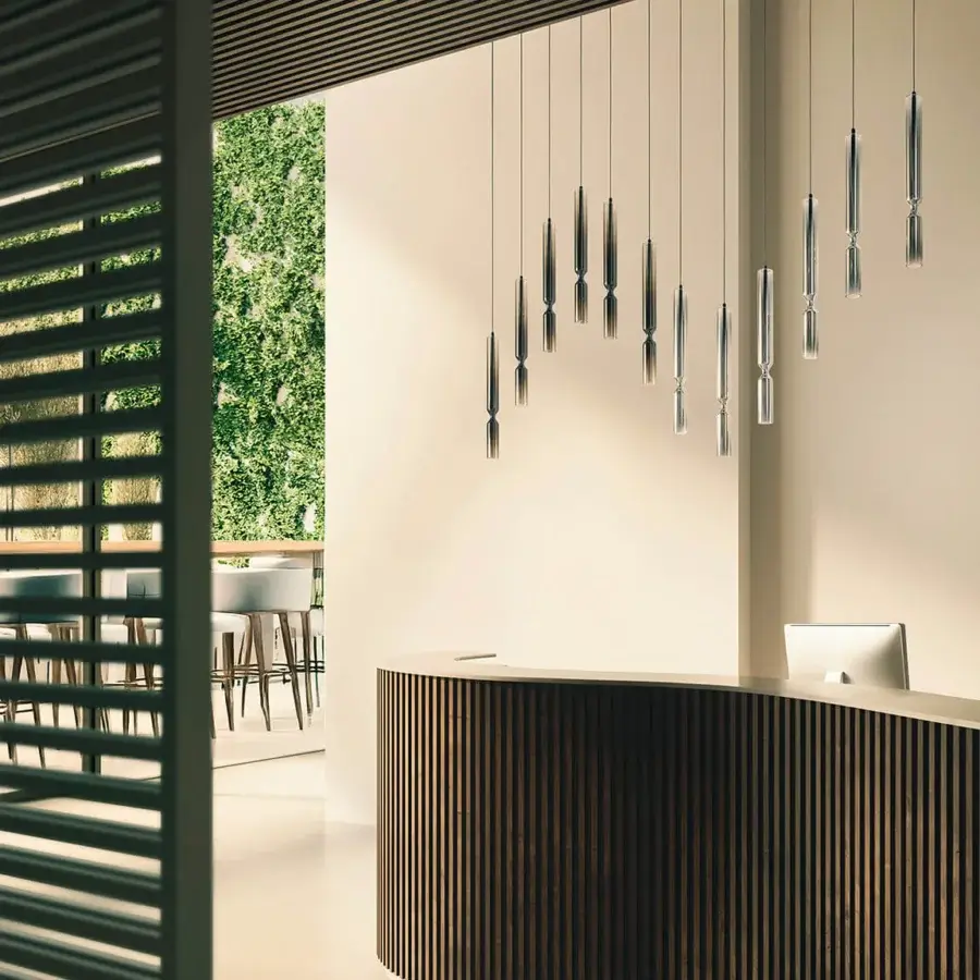 Distinguished Penta Misty suspension lamp crafted in glass and aluminum with a silver semi-transparent finish and satin cylinders
