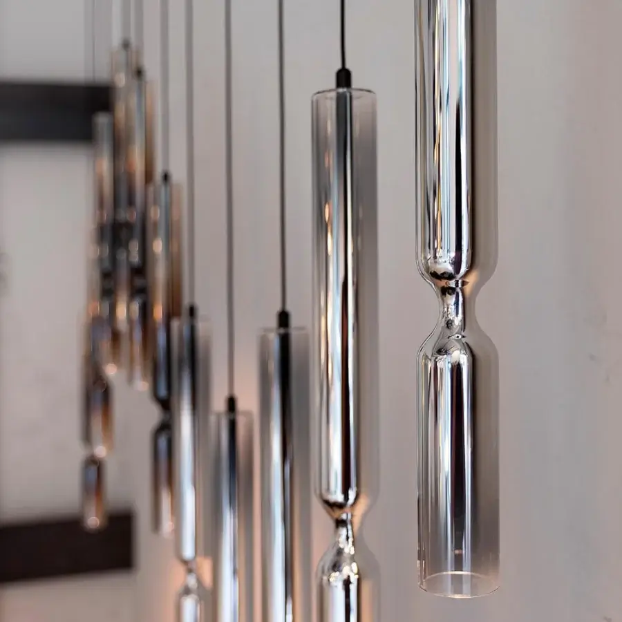 Captivating Penta Misty suspension lamp crafted in glass and metallic silver with a subtle veiled inner structure