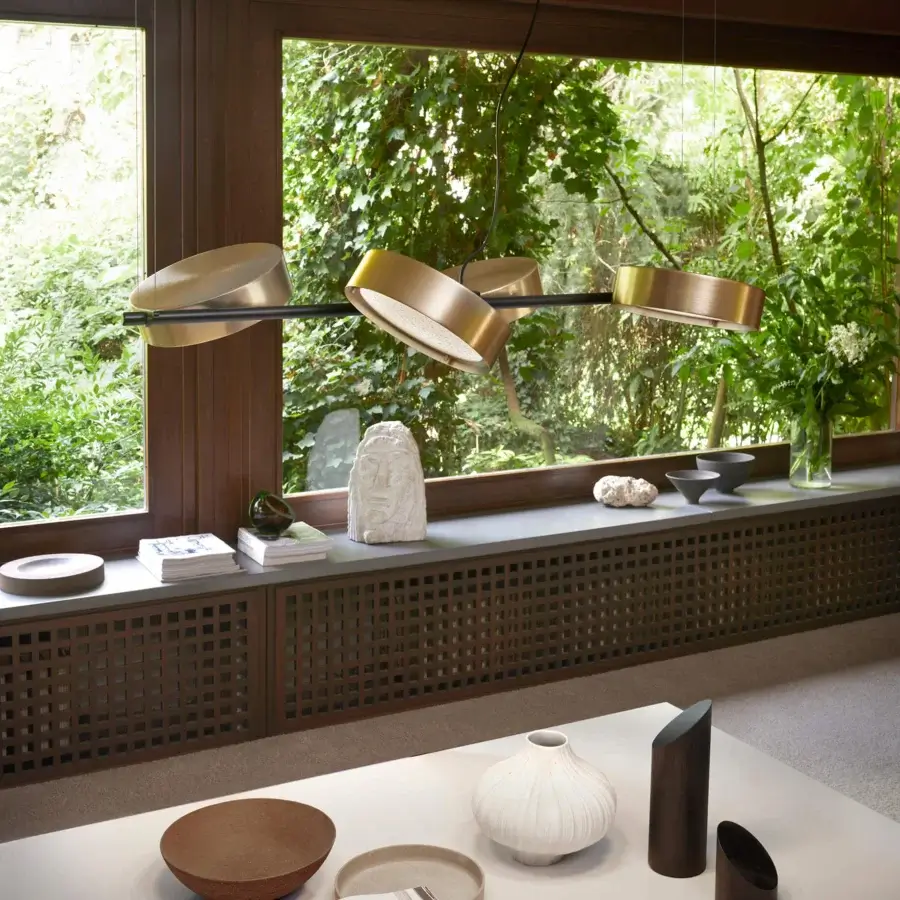 Elegant Oluce Berlin suspension lamp with rotating wired glass discs and a warm muted gold finish