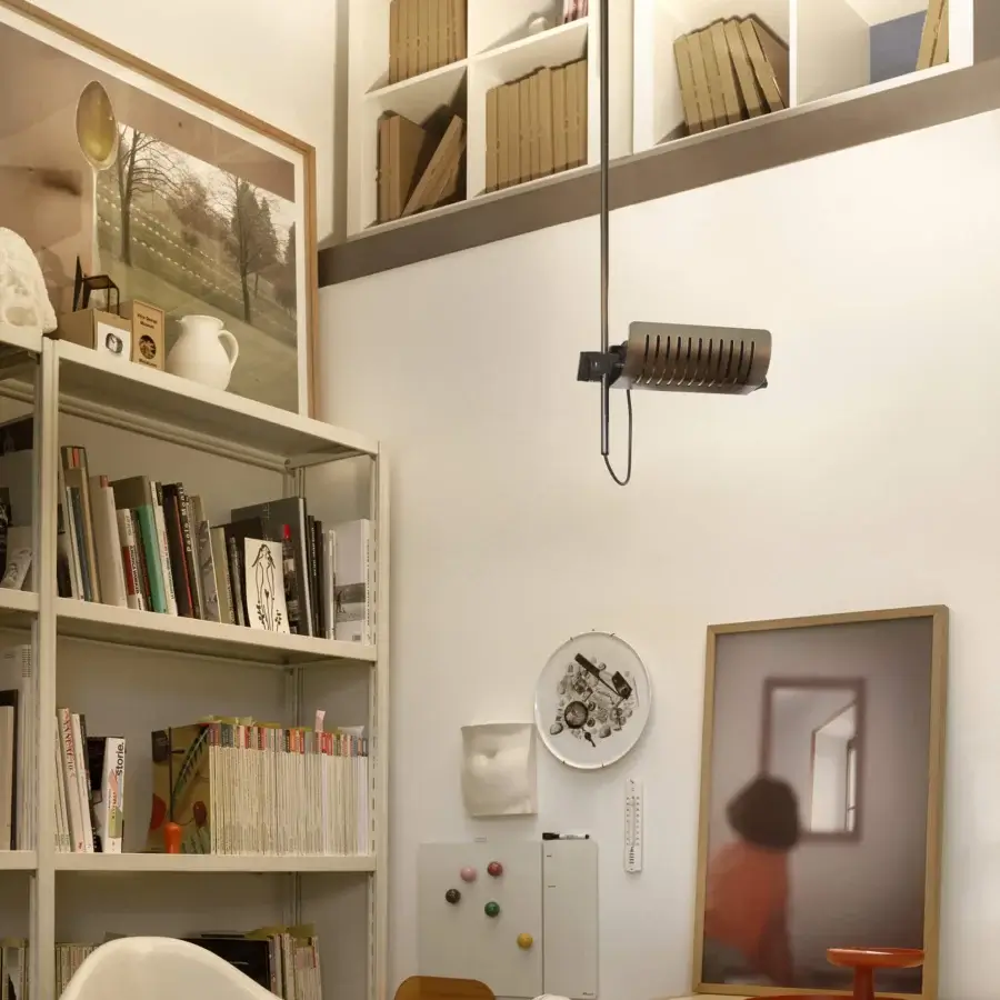 Elegant Oluce Colombo suspension lamp with a sleek cylindrical form crafted in black matte metal and modern LED technology