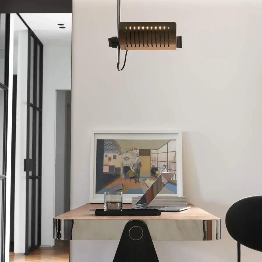 Superior Oluce Colombo suspension lamp with a minimalist rectangular form built in dark matte metal and diffused openings