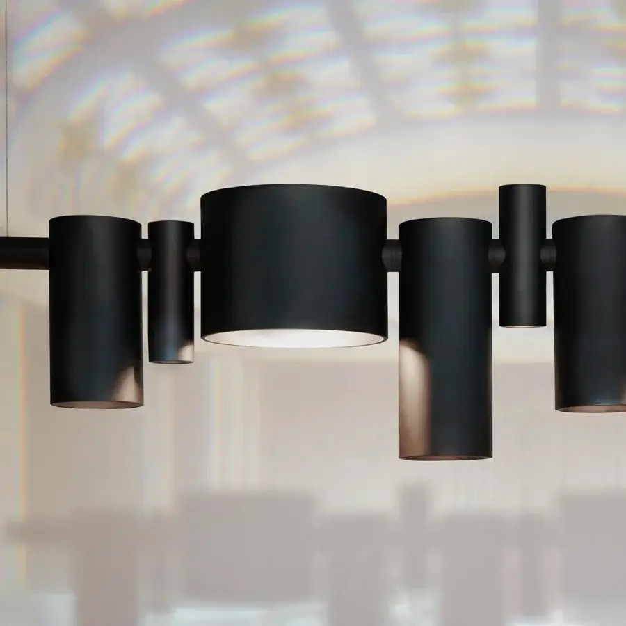 Superior Oluce Dancing Queen suspension lamp crafted in matte black metal with ten adjustable cylindrical lights