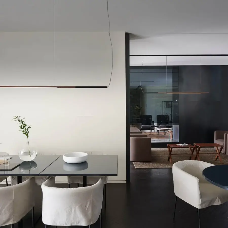 Exclusive Oluce Ilo suspension lamp crafted in aluminum with a satin bronze finish offering refined elegance