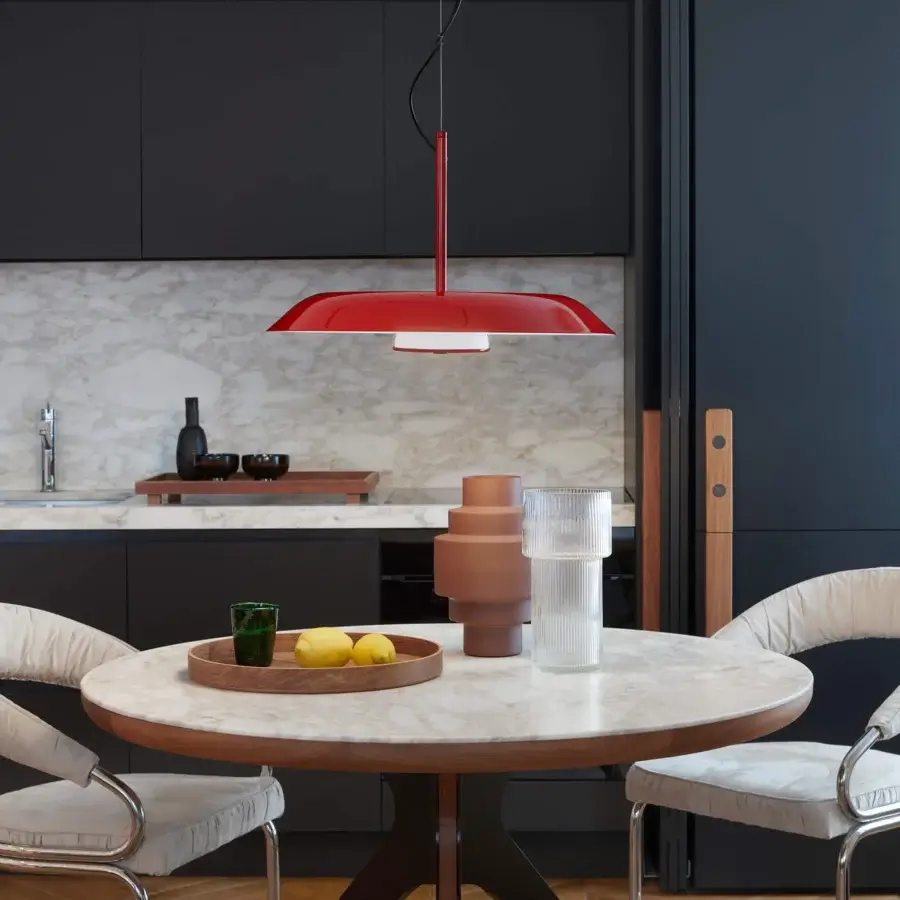 Exceptional Oluce Iride suspension lamp crafted in metal with glossy red exterior and reflective white interior