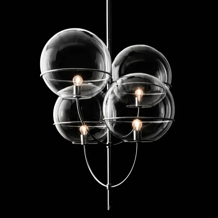 Exceptional Oluce Lyndon suspension lamp crafted in polished metal with four transparent glass spheres creating a minimalist silhouette