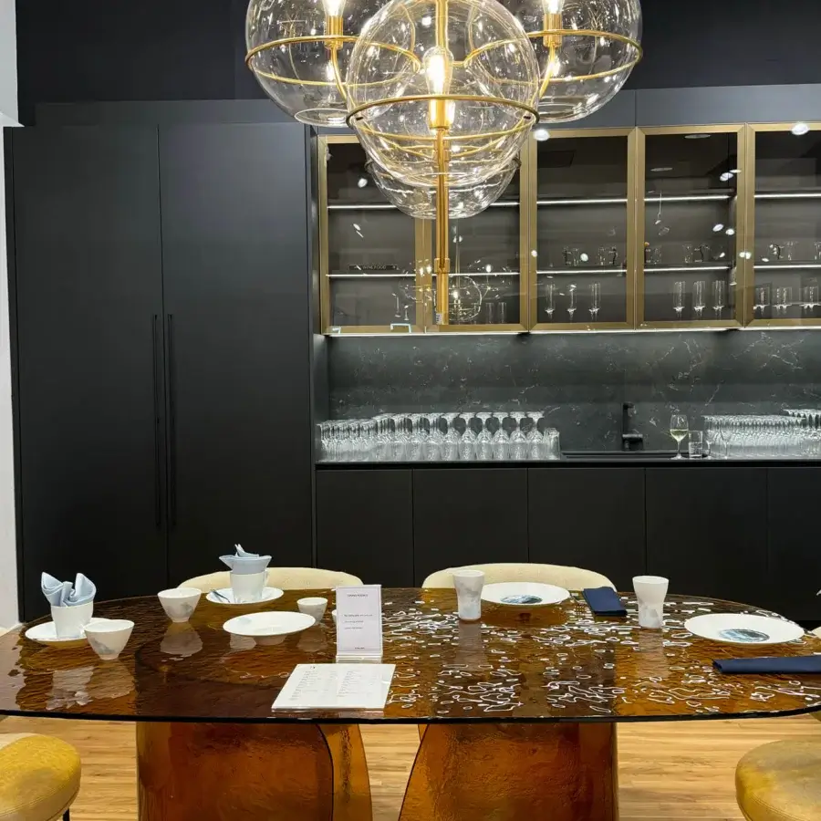Superior Oluce Lyndon suspension lamp with a candelabra structure and cluster of transparent glass shades in polished golden-toned metal