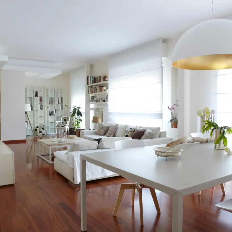 Elegant Oluce Sonora lamp suspension crafted in Italy with glossy white exterior and gold interior