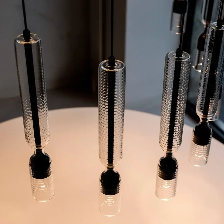 Superior Penta Misty Texture suspension lamp in clear borosilicate glass with sleek black interspersed sections and horizontal texture
