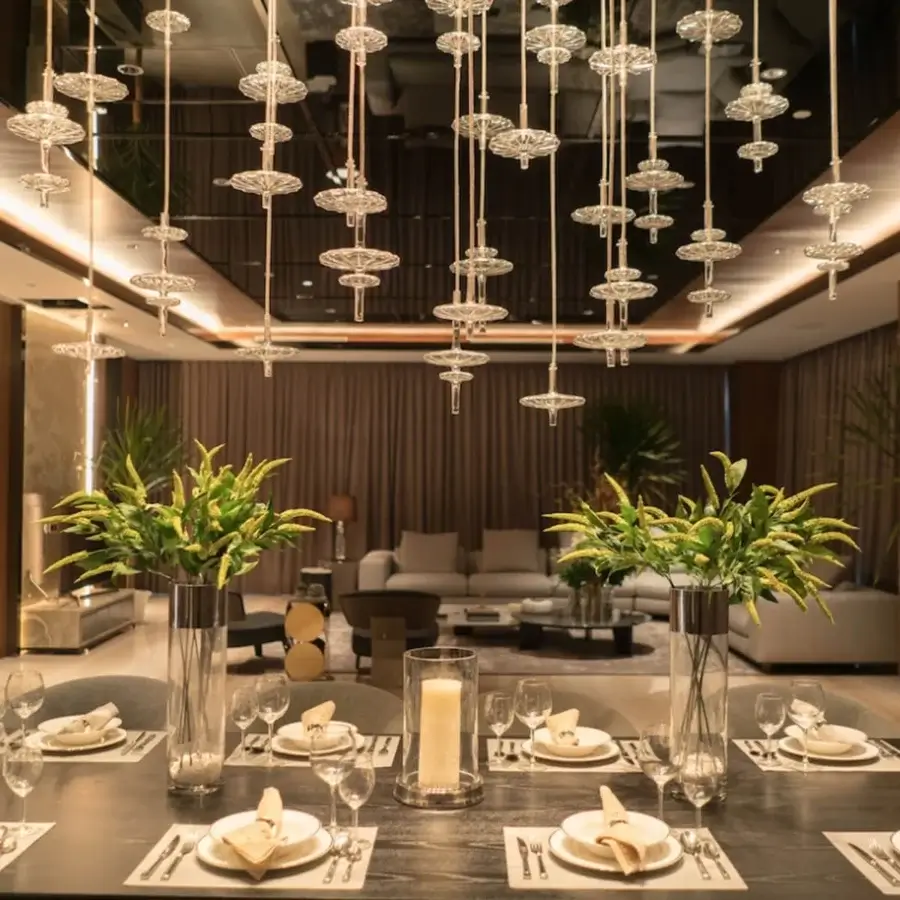 Distinguished melogranoblu Hydra - Gamma suspension lamp with hand-blown glass pendants and colored metallic cords crafted in Italy with a mirror finish