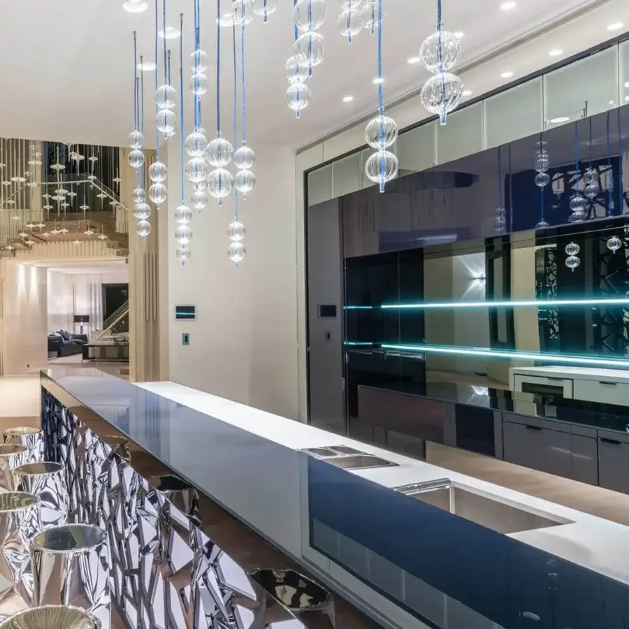 Lavish melogranoblu Hydra - Lambda suspension lamp with fifteen hand-blown glass pendants and vibrant blue metallic cords crafted in mirror finish metal