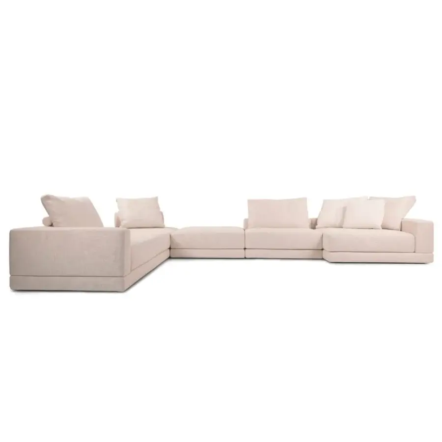 Distinguished Verzelloni Lands sectional with pale blush textile upholstery and concealed black lacquered beech wood feet