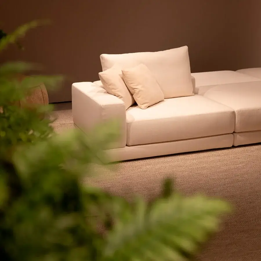 Distinguished Verzelloni Lands sectional with pale beige textured upholstery and concealed black lacquered beech wood feet