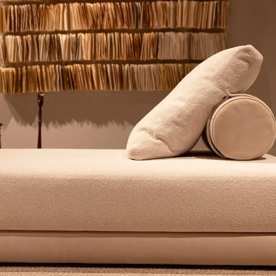 Superior Verzelloni Lands daybed in neutral beige fabric with recessed black lacquered beech wood feet and textured finish