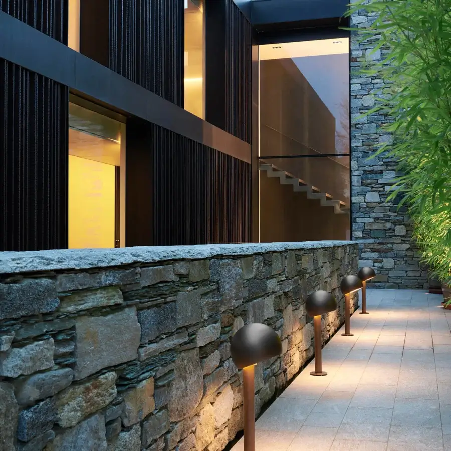 Superior Oluce Otto floor lamp crafted in Italy with a sleek cylindrical form and matte dark bronze metal finish