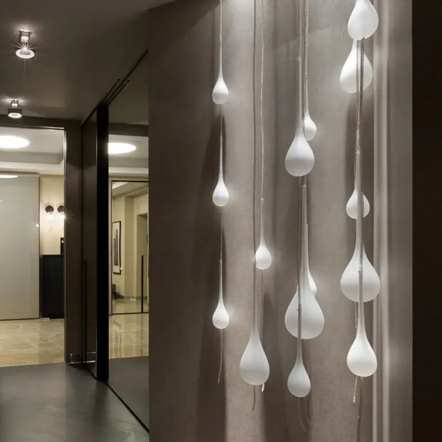 Exclusive melogranoblu Hydra suspension lamp with hand-blown glass diffusers suspended by colored metallic cords in mirror finish