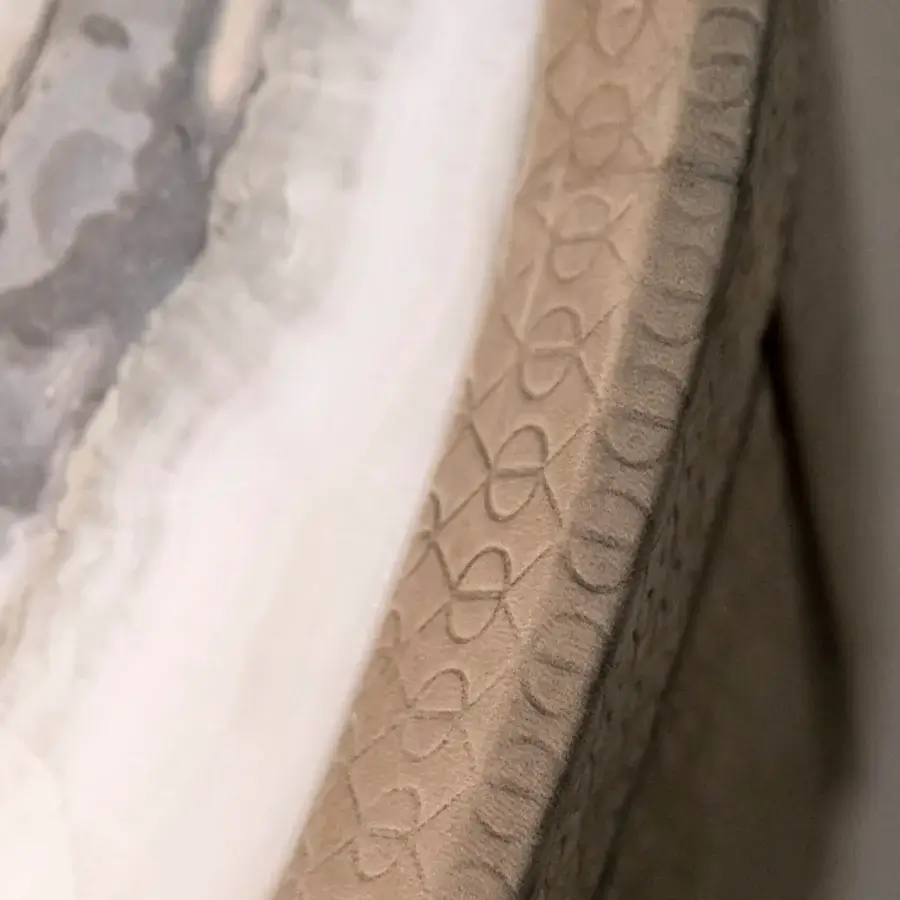 Sophisticated Rugiano Beverly nightstand with varnished bronze structure and Calacatta marble top in cool light tones