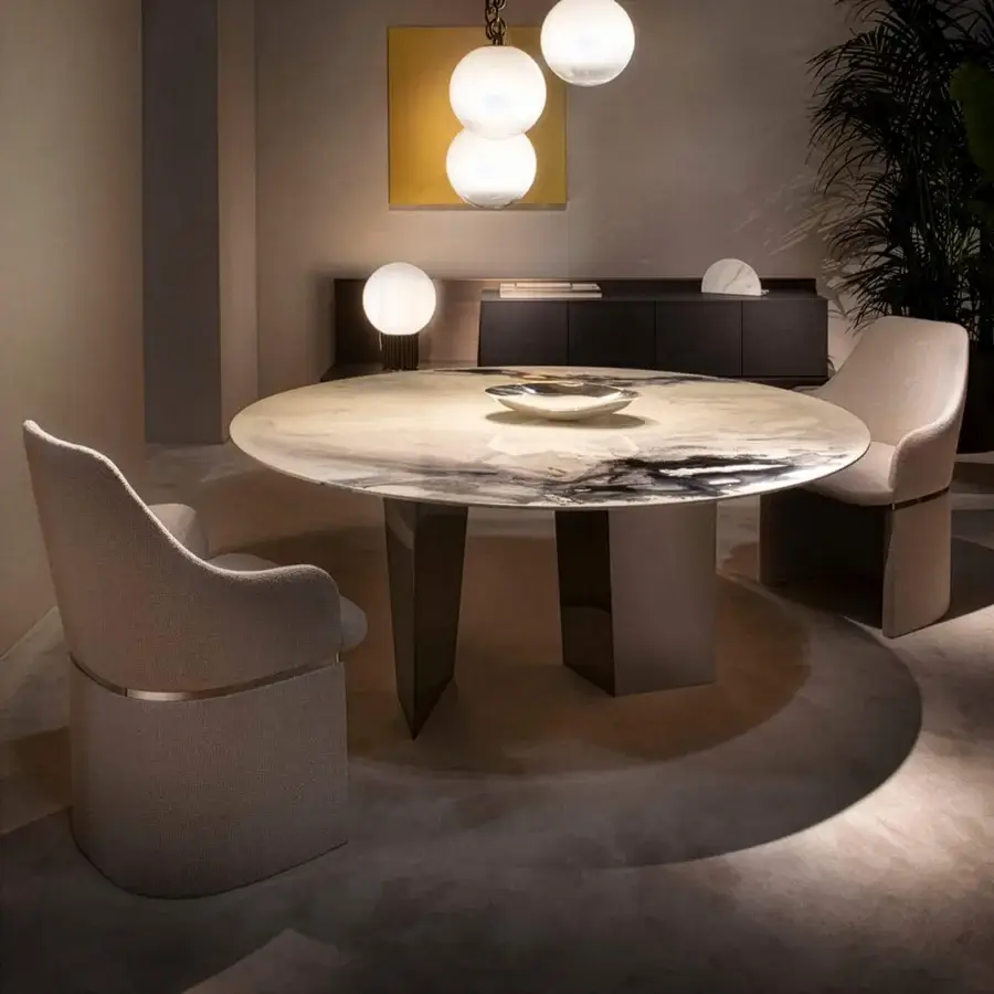 Elegant Rugiano Blanco table with swirling white and gray marble tabletop and satin-finish metal base