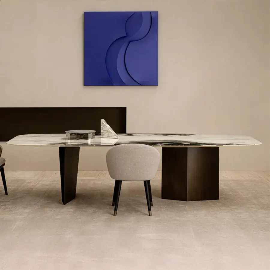 Distinguished Rugiano Blanco table with a stunning marble tabletop and refined metal base exhibiting dark tones