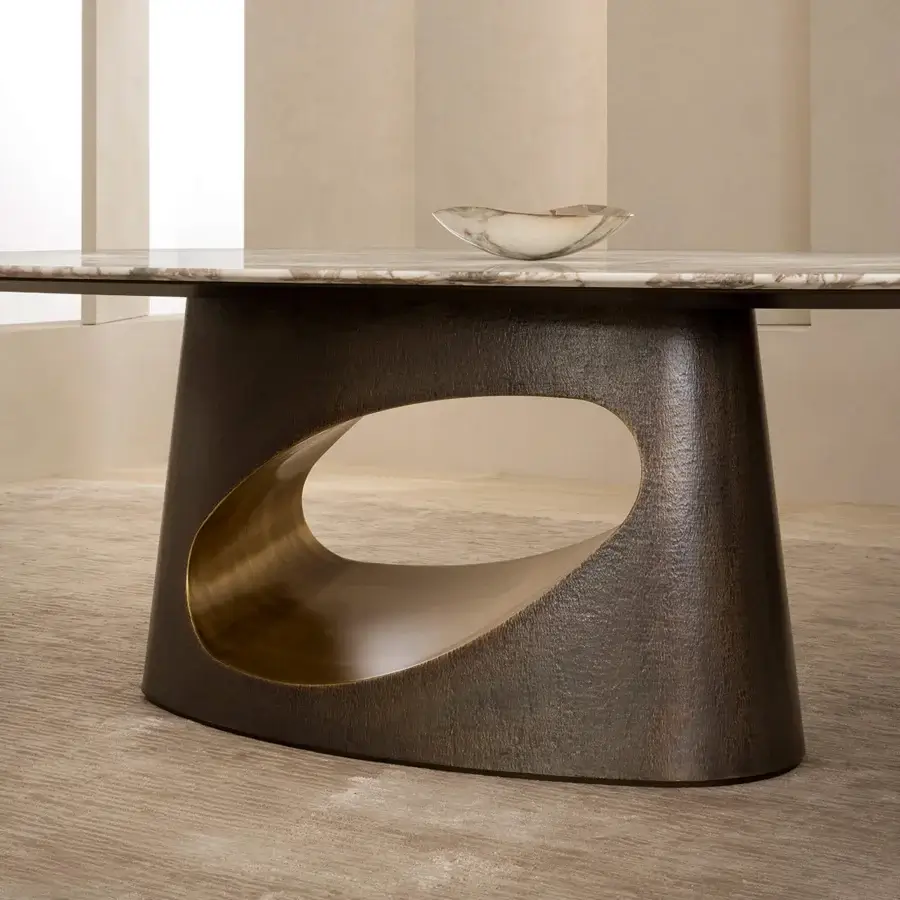 Distinguished Rugiano Ring table with sculpted bronze and marble exhibiting subtle grey veining in dark-toned wood finish