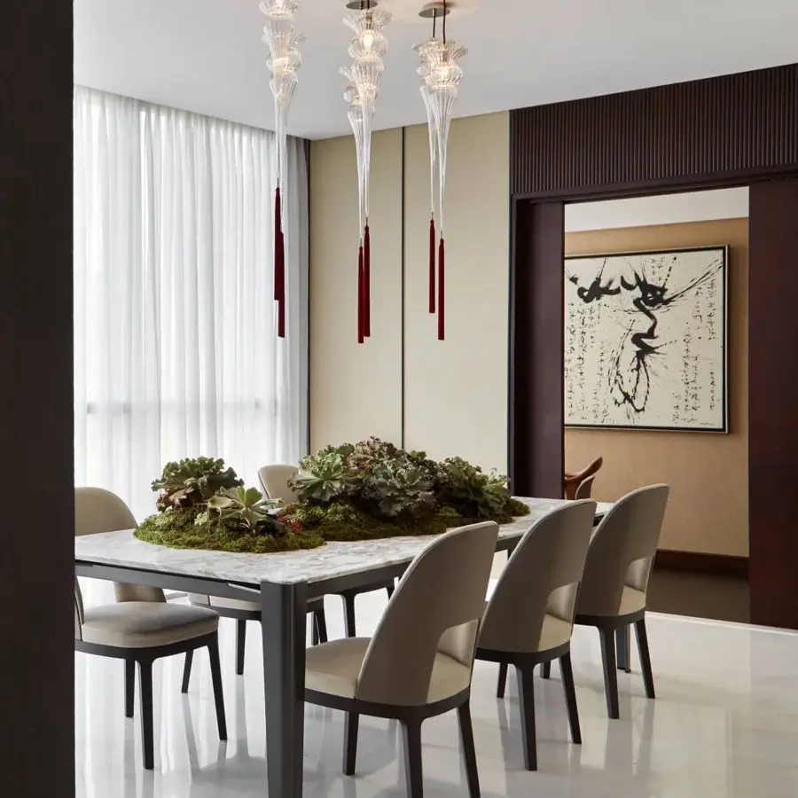 Captivating melogranoblu Opera - Turandot suspension lamp handcrafted from ruled hand-blown glass with clear glass and dark red cylindrical accents