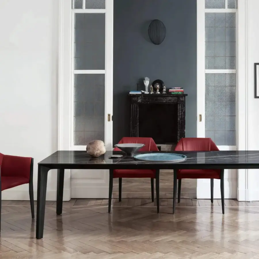 Distinguished Bontempi Versus table with dark polished marble and elegantly angled matte-finish wooden legs