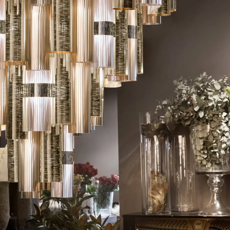 Elegant Slamp La Lollona suspension lamp with pale beige Lentiflex® cylinders and reflective metallic accents