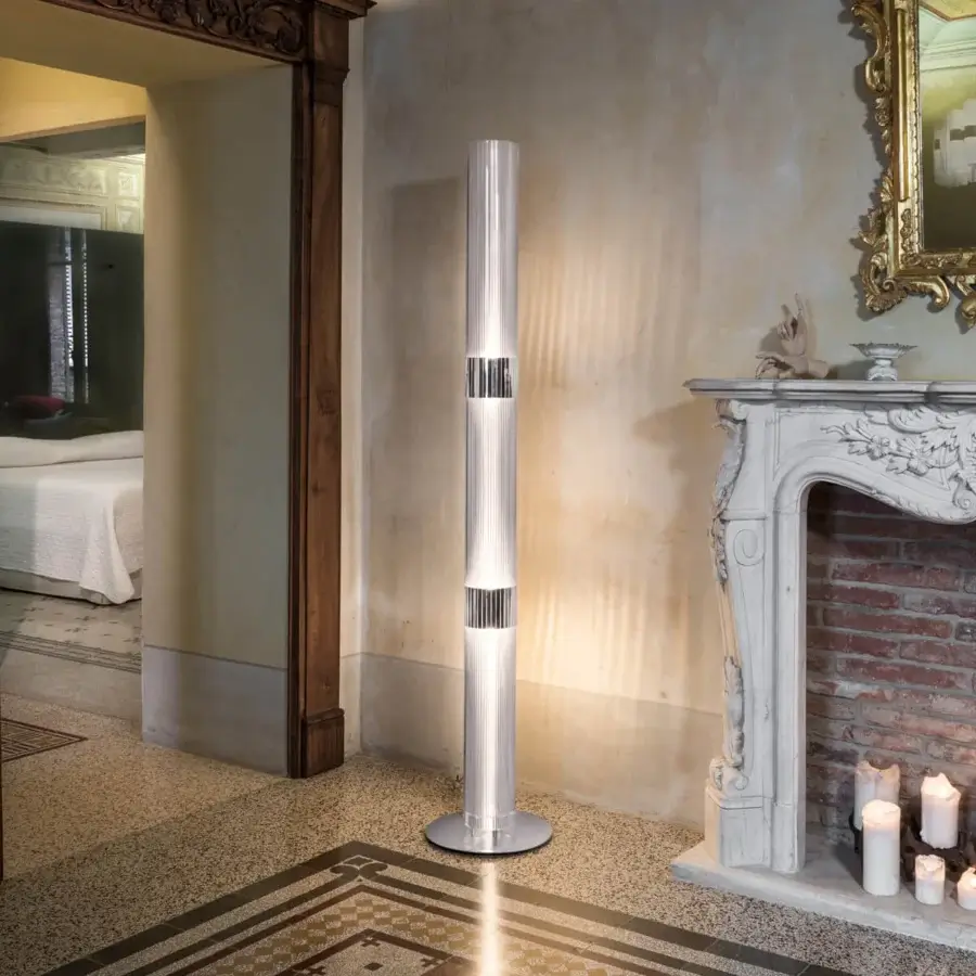 Superior Slamp La Lollo floor lamp with vertically-engraved rings crafted in Lentiflex®, Opalflex® and polished steel with a silver-grey finish