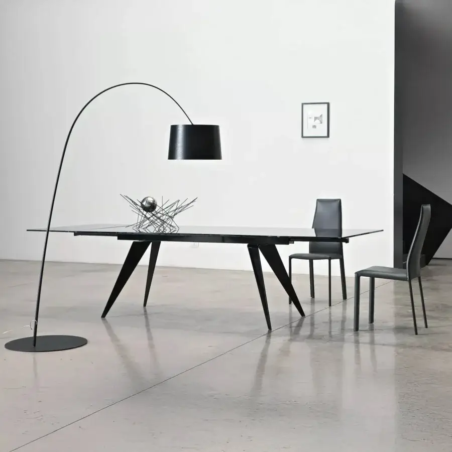 Distinguished Bontempi Ramos table with tinted glass tabletop and dark matte metal base embodies minimalist design