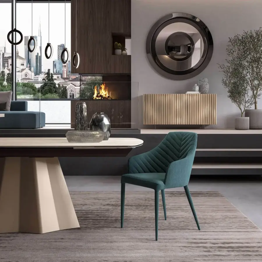 Superior Ozzio Italia Regiorgio armchair upholstered in teal Tango fabric and soft eco-leather nabuk with slender metal legs
