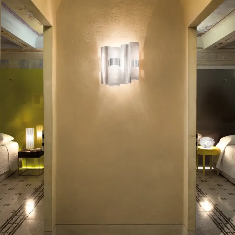 Superior Slamp La Lollo wall lamp with pale greyish-white gradient crafted in Lentiflex® and Opalflex® technopolymers with dark grey metallic backing