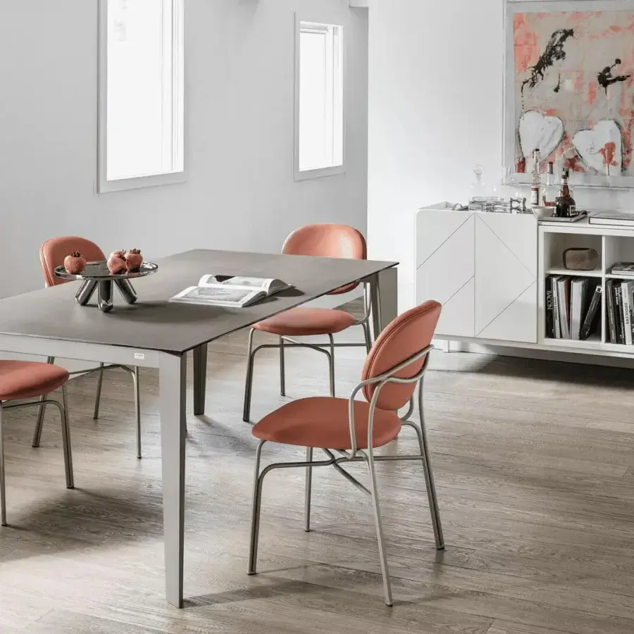 Superior Bontempi Dada chair with a metal frame and terracotta textile upholstery with satin finish