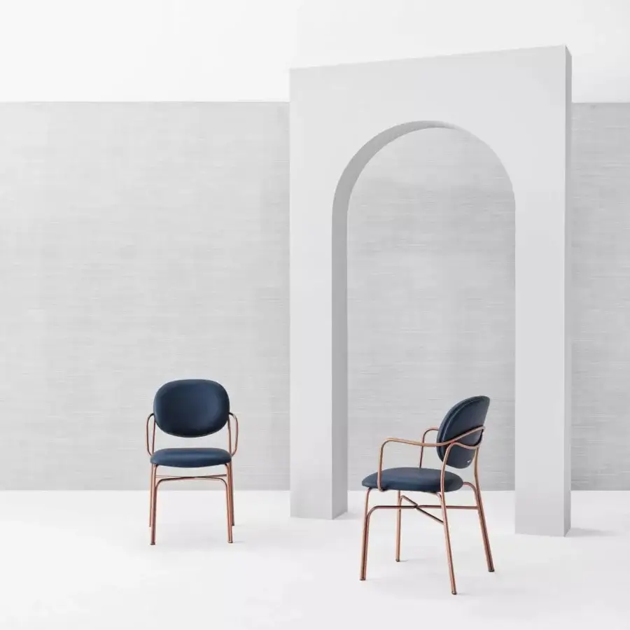 Distinguished Bontempi Dada chair with a sleek metal frame and deep navy blue textile upholstery in satin rose-gold tone