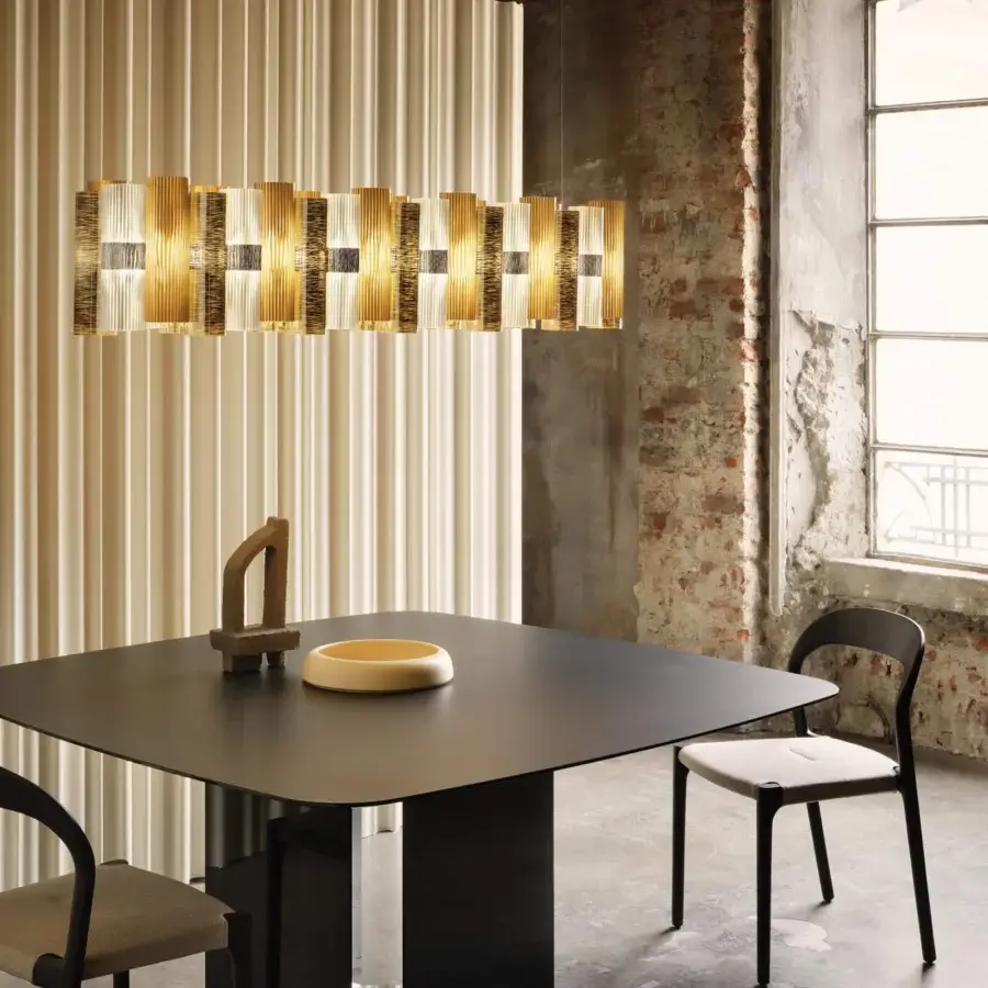 Superior Slamp La Lollo Linear suspension lamp in technopolymer with Lentiflex® and Opalflex® displaying a golden yellow striped finish