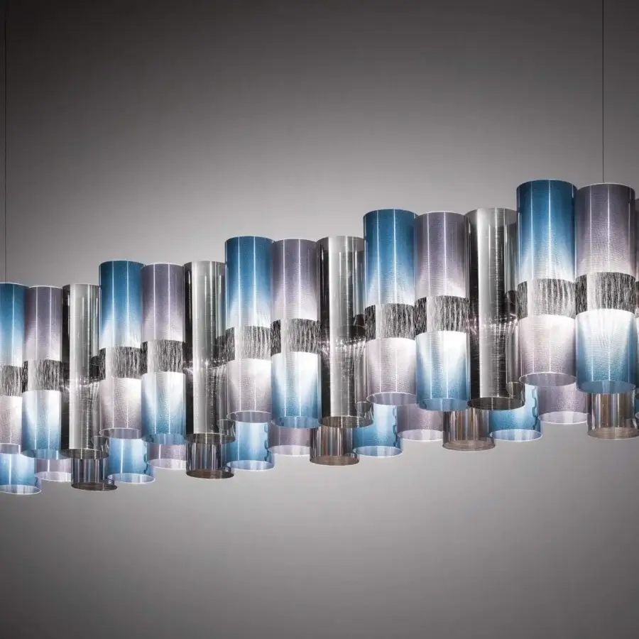 Distinguished Slamp La Lollo Linear suspension lamp crafted in Lentiflex® with Opalflex® finish displaying blue, gray and purple gradients