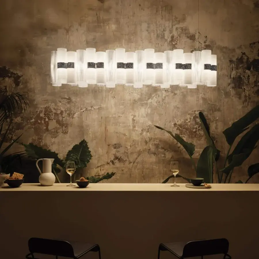 Distinguished Slamp La Lollo Linear suspension lamp in Lentiflex® with Opalflex® finish crafted from unbreakable technopolymer cylinders